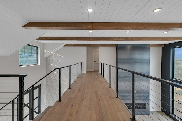 11694 Indian Beach Rd, Spicer, MN 56288 - hall with an upstairs landing, recessed lighting, light wood-style flooring, and wooden ceiling