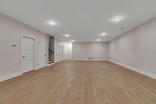 11694 Indian Beach Rd, Spicer, MN 56288 - below grade area with light wood finished floors, stairway, and recessed lighting