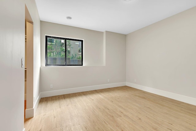 11694 Indian Beach Rd, Spicer, MN 56288 - unfurnished room featuring light wood-type flooring and baseboards