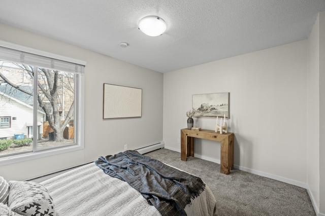 3729 Snelling Ave Unit 203, Minneapolis, MN 55406 - bedroom featuring baseboards, carpet, a baseboard heating unit, and a textured ceiling