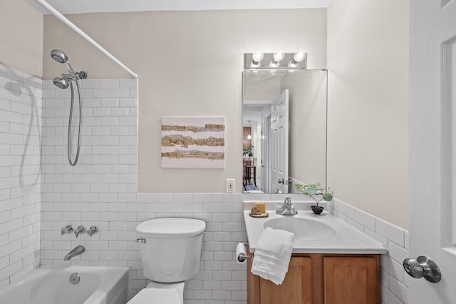 3729 Snelling Ave Unit 203, Minneapolis, MN 55406 - bathroom featuring shower / bathtub combination, vanity, a wainscoted wall, toilet, and tile walls