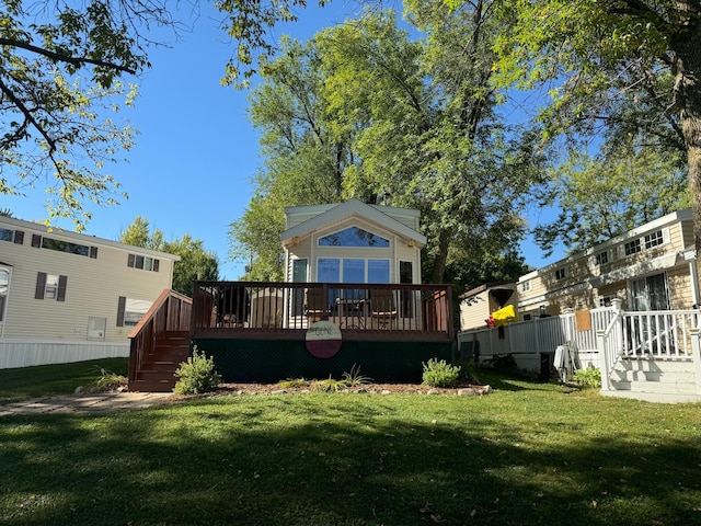 18096 Browns Lake Rd # 17, Richmond, MN 56368 - back of property featuring a wooden deck, stairway, and a yard
