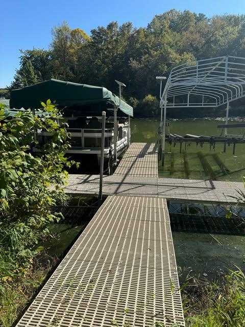 18096 Browns Lake Rd # 17, Richmond, MN 56368 - view of dock featuring boat lift