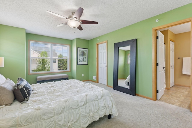 9512 Scott Ln N, Brooklyn Park, MN 55443 - bedroom featuring carpet flooring, a textured ceiling, baseboards, and a ceiling fan