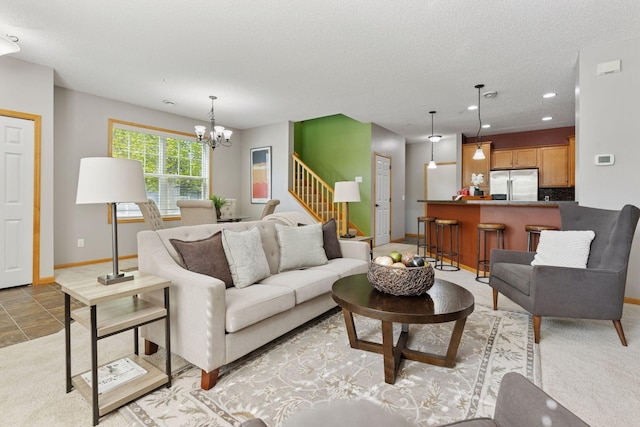 9512 Scott Ln N, Brooklyn Park, MN 55443 - living room with a chandelier, baseboards, recessed lighting, stairs, and a textured ceiling