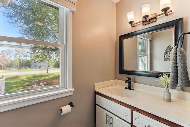 bathroom featuring plenty of natural light and vanity