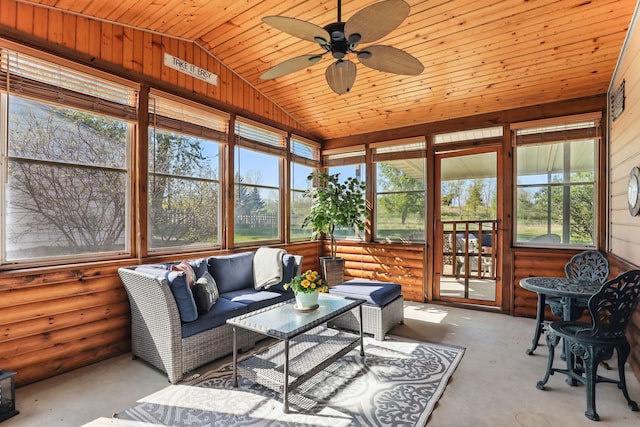 sunroom featuring lofted ceiling, a ceiling fan, and an outdoor hangout area