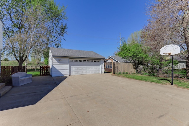 detached garage with fence