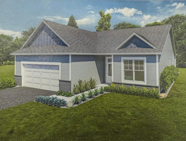view of front facade with an attached garage, driveway, and a front yard