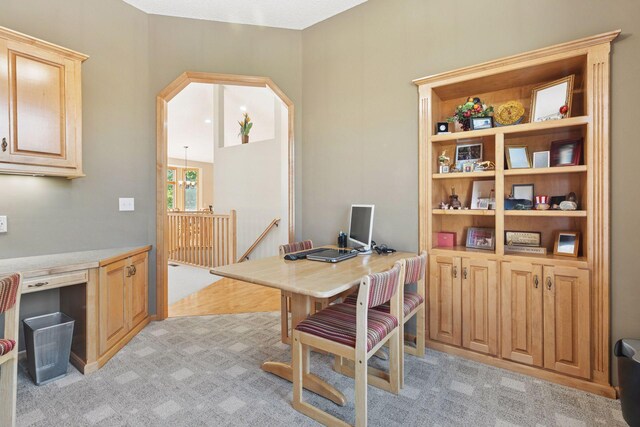 11871 Flanders Cir NE, Blaine, MN 55449 - home office featuring arched walkways and light colored carpet