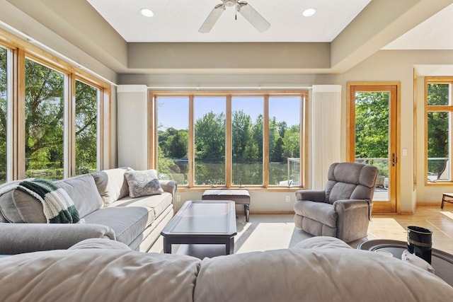 11871 Flanders Cir NE, Blaine, MN 55449 - living area with healthy amount of natural light, a ceiling fan, and recessed lighting