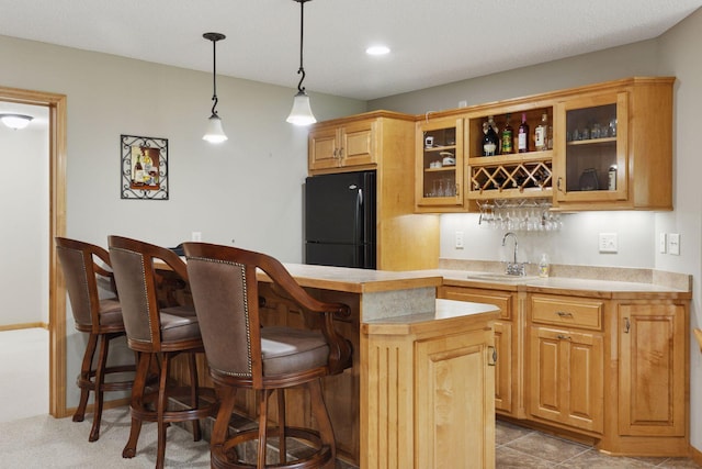 11871 Flanders Cir NE, Blaine, MN 55449 - indoor wet bar with freestanding refrigerator, pendant lighting, and recessed lighting