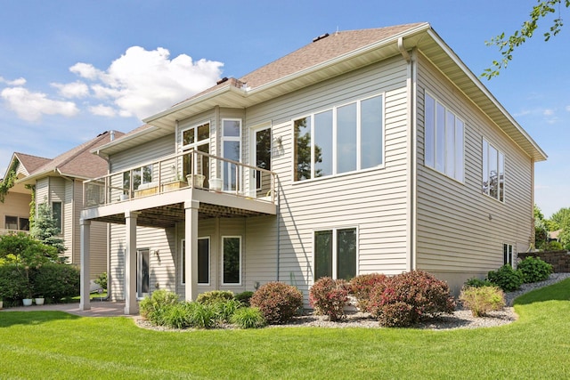 11871 Flanders Cir NE, Blaine, MN 55449 - back of property with a balcony and a lawn