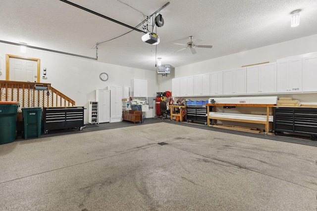 11871 Flanders Cir NE, Blaine, MN 55449 - garage with ceiling fan and a garage door opener