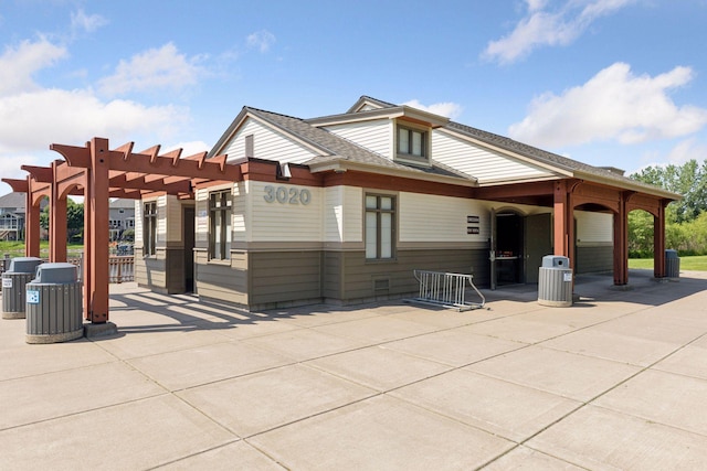 11871 Flanders Cir NE, Blaine, MN 55449 - view of front of property with a pergola and a patio