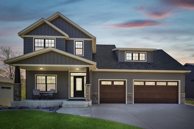 3344 26th Ave S, Saint Cloud, MN 56301 - craftsman inspired home with covered porch, a garage, board and batten siding, driveway, and stone siding