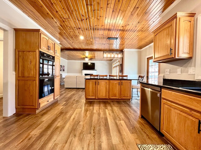 2543 Sunny Meadow Ln, Red Wing, MN 55066 - kitchen with stainless steel dishwasher, wooden ceiling, dark countertops, open floor plan, and light wood-type flooring
