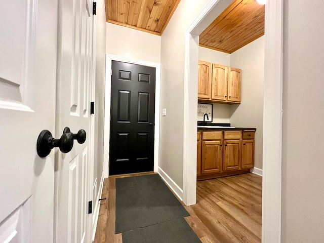 2543 Sunny Meadow Ln, Red Wing, MN 55066 - entrance foyer featuring wooden ceiling, light wood finished floors, and baseboards