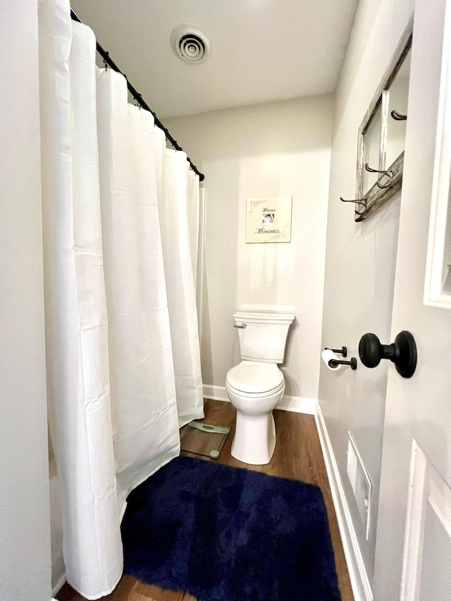 2543 Sunny Meadow Ln, Red Wing, MN 55066 - full bathroom featuring toilet, wood finished floors, and baseboards