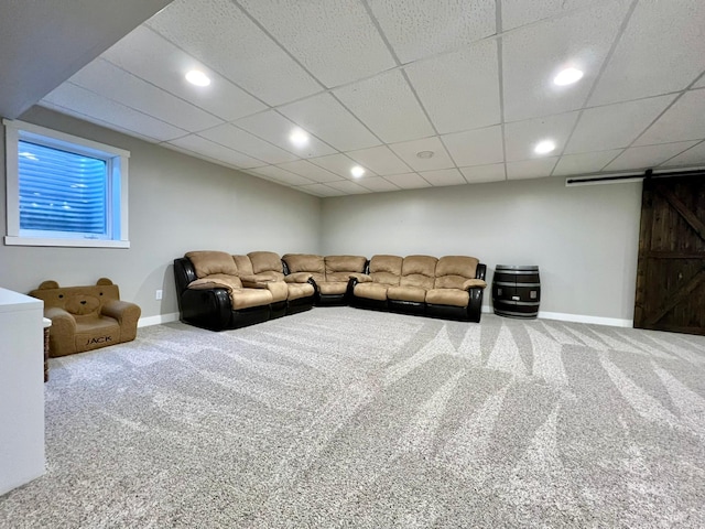 2543 Sunny Meadow Ln, Red Wing, MN 55066 - carpeted living room featuring a barn door, baseboards, recessed lighting, and a drop ceiling