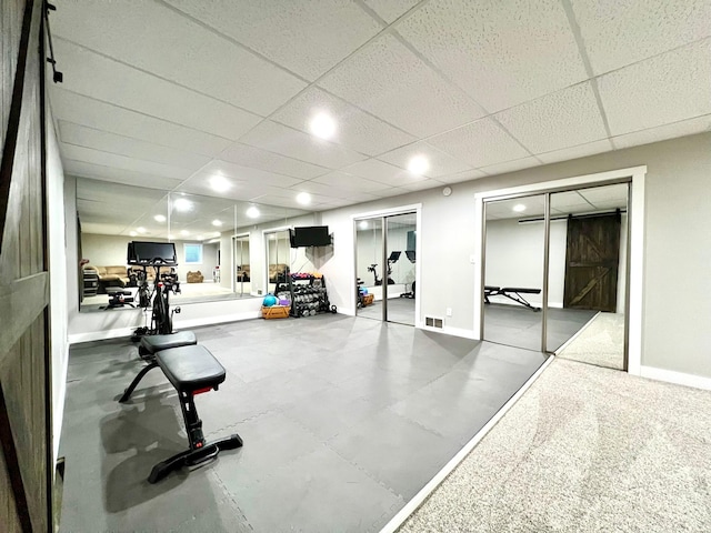 2543 Sunny Meadow Ln, Red Wing, MN 55066 - gym with baseboards, a drop ceiling, and recessed lighting