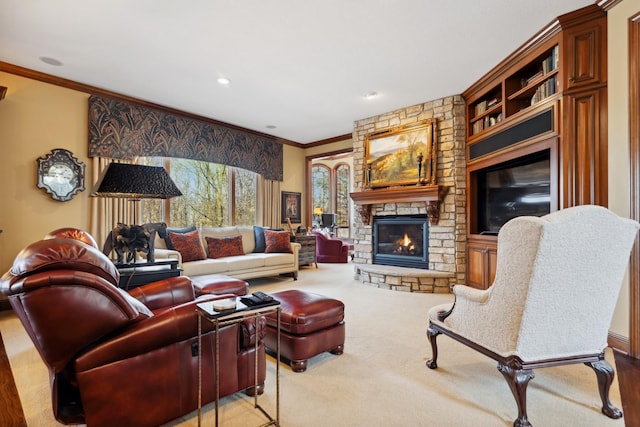 living room with recessed lighting, a stone fireplace, ornamental molding, and carpet