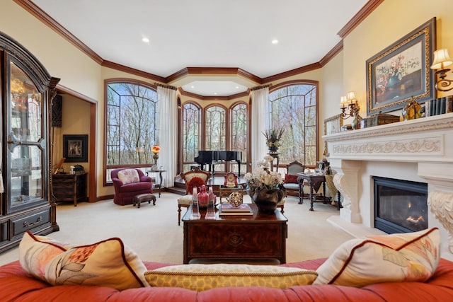 carpeted living area with crown molding, recessed lighting, a glass covered fireplace, and a wealth of natural light
