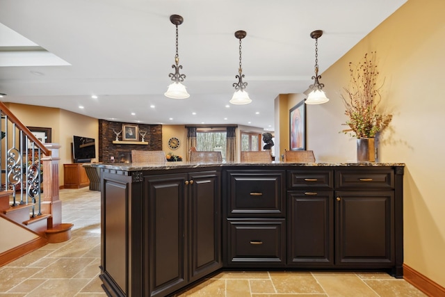 interior space featuring pendant lighting, stairs, indoor wet bar, recessed lighting, and backsplash