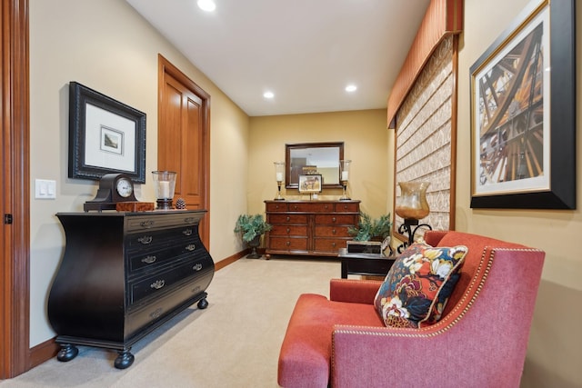 sitting room featuring carpet floors, recessed lighting, and baseboards