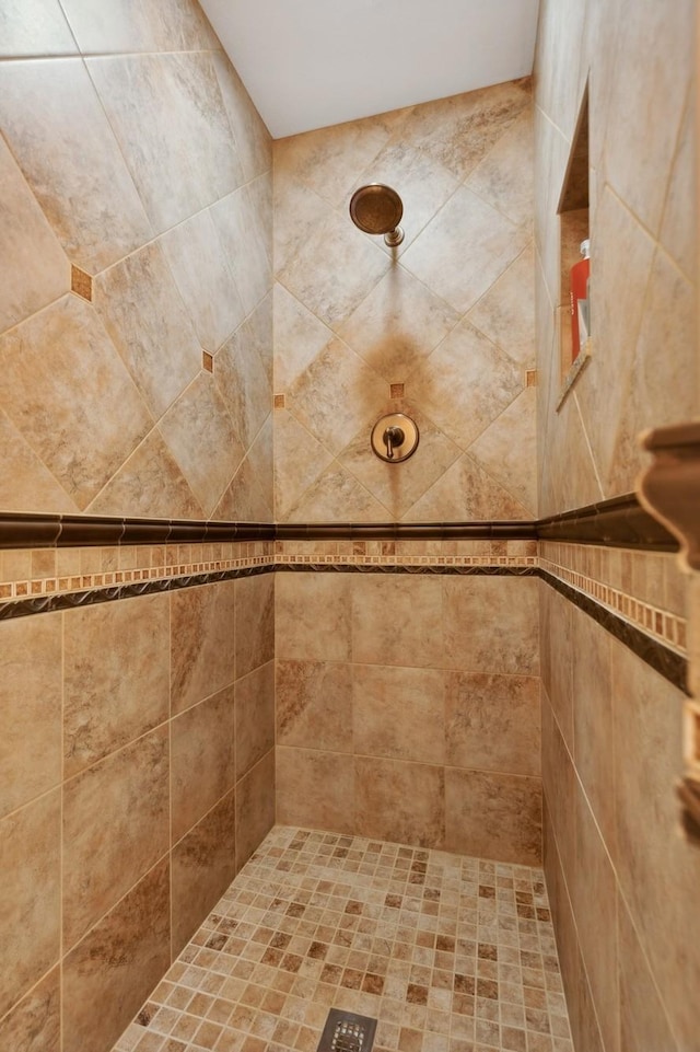 bathroom featuring tiled shower