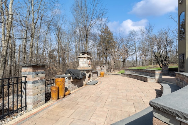 view of patio featuring fence