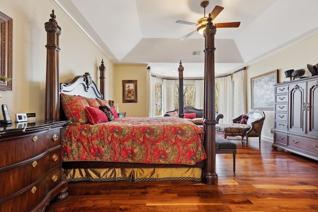 17620 Xanadu Ave, Jordan, MN 55352 - bedroom with wood finished floors, lofted ceiling, ornamental molding, and a tray ceiling
