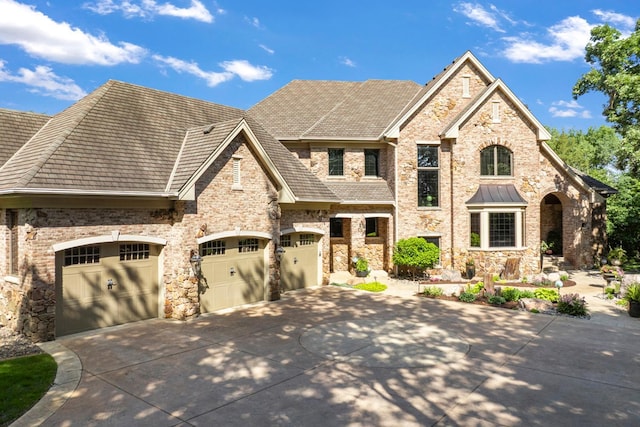 17620 Xanadu Ave, Jordan, MN 55352 - view of front facade featuring driveway and stone siding