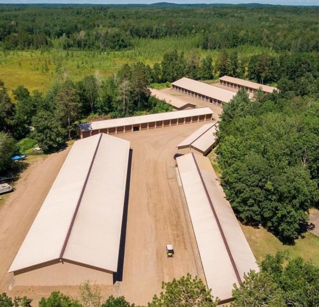 aerial view featuring a forest view