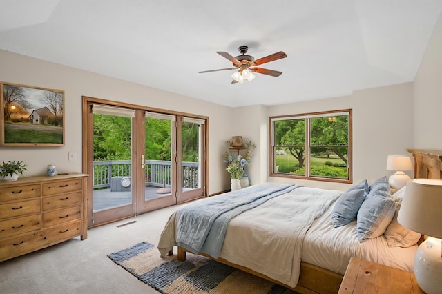 1159 Orwell Ave N, West Lakeland Twp, MN 55082 - bedroom featuring access to exterior, light carpet, and a ceiling fan