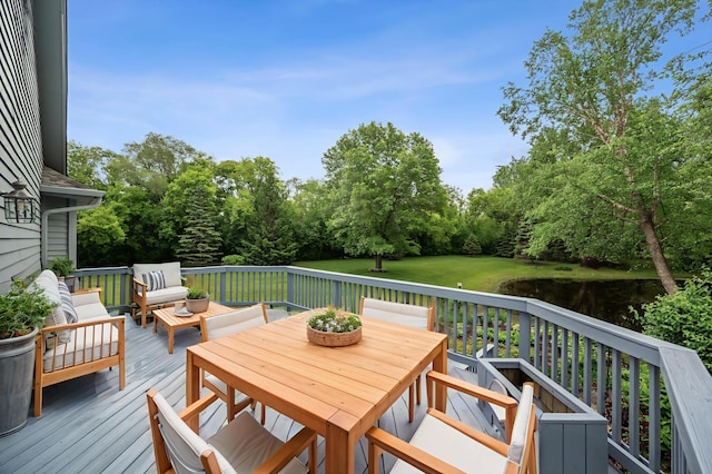 1159 Orwell Ave N, West Lakeland Twp, MN 55082 - wooden terrace featuring view of scattered trees, outdoor lounge area, a water view, and outdoor dining space