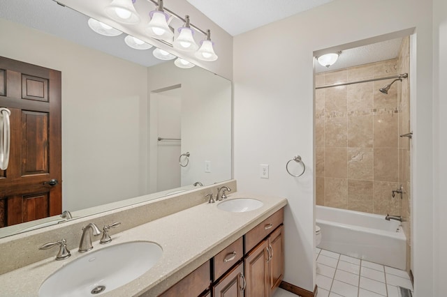1159 Orwell Ave N, West Lakeland Twp, MN 55082 - full bathroom with toilet, double vanity, tile patterned floors, and tub / shower combination