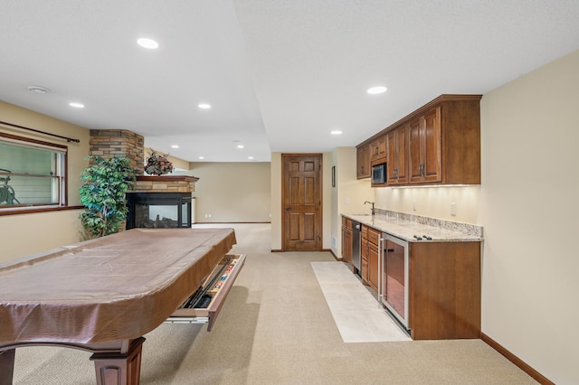 1159 Orwell Ave N, West Lakeland Twp, MN 55082 - game room featuring bar with sink, light carpet, a multi sided fireplace, recessed lighting, and pool table