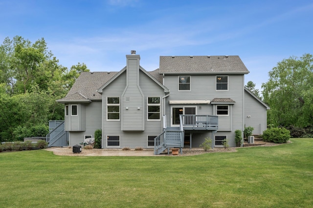 1159 Orwell Ave N, West Lakeland Twp, MN 55082 - rear view of house featuring a wooden deck, a yard, a chimney, and stairs