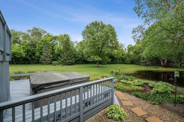 1159 Orwell Ave N, West Lakeland Twp, MN 55082 - view of green lawn featuring a hot tub and a deck with water view