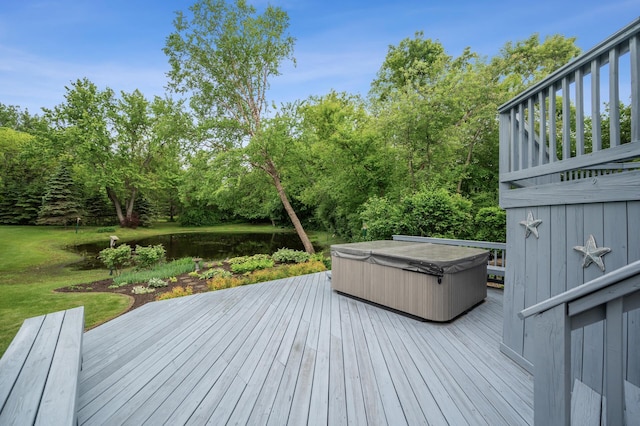 1159 Orwell Ave N, West Lakeland Twp, MN 55082 - deck featuring a hot tub and a water view