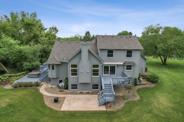 1159 Orwell Ave N, West Lakeland Twp, MN 55082 - back of property with a patio, stairs, a wooden deck, a chimney, and a lawn