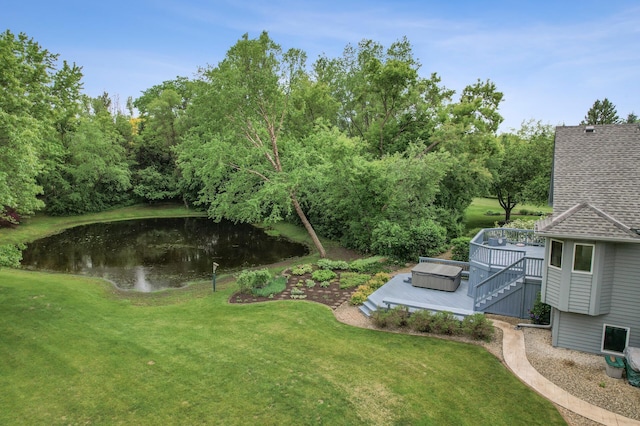 1159 Orwell Ave N, West Lakeland Twp, MN 55082 - view of green lawn with a deck with water view and stairs