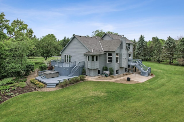 1159 Orwell Ave N, West Lakeland Twp, MN 55082 - rear view of property featuring stairway, a wooden deck, a hot tub, and a shingled roof