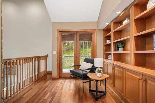 6507 Orchard Ridge Trl, Woodbury, MN 55129 - sitting room featuring light wood finished floors, lofted ceiling, and recessed lighting