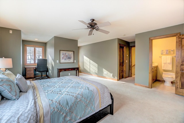 6507 Orchard Ridge Trl, Woodbury, MN 55129 - bedroom with light colored carpet, a ceiling fan, and ensuite bathroom