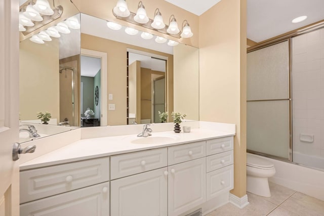 6507 Orchard Ridge Trl, Woodbury, MN 55129 - bathroom featuring tile patterned floors, vanity, and shower / bath combination with glass door