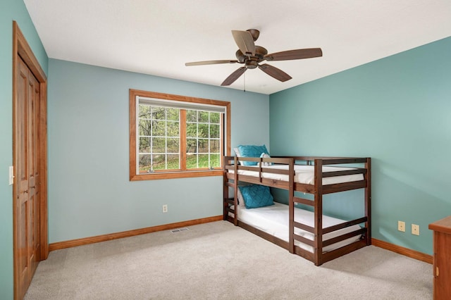 6507 Orchard Ridge Trl, Woodbury, MN 55129 - unfurnished bedroom with carpet flooring, a closet, and a ceiling fan