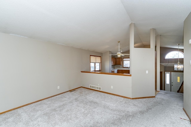 2625 Westview Ln NW, Rochester, MN 55901 - unfurnished living room with plenty of natural light, carpet, and visible vents