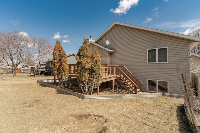 2625 Westview Ln NW, Rochester, MN 55901 - rear view of house with a wooden deck and stairway